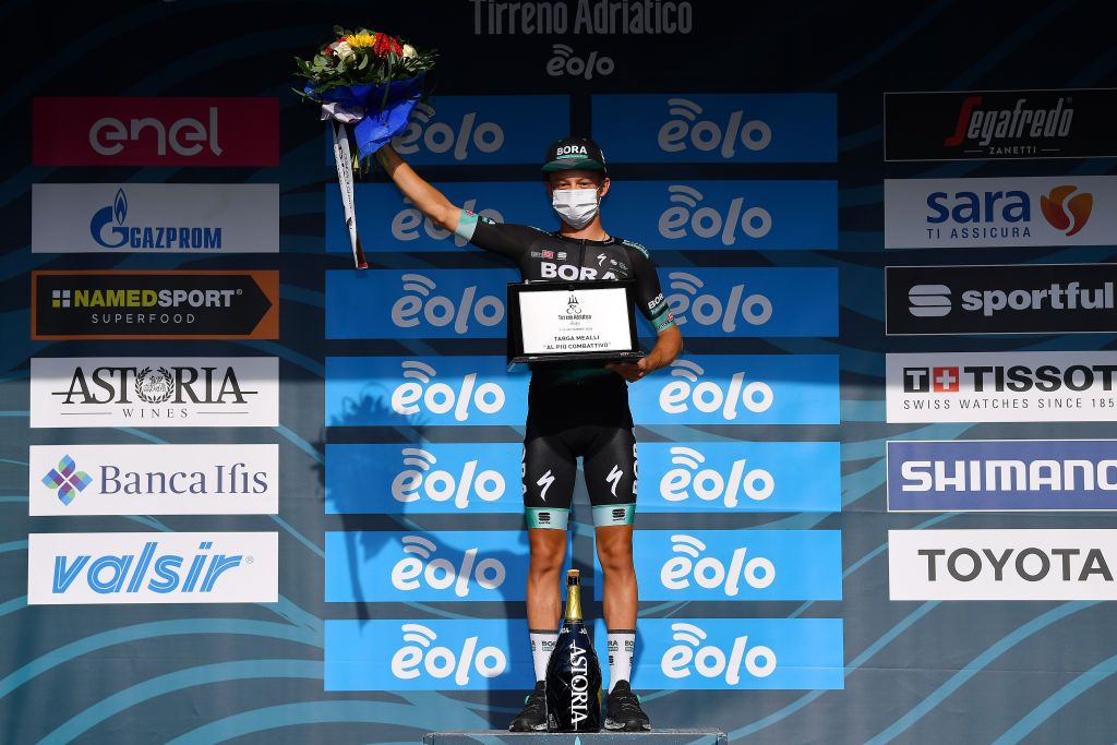 SAN BENEDETTO DEL TRONTO ITALY SEPTEMBER 14 Podium Matteo Fabbro of Italy and Team BoraHansgrohe Most Combative Rider Celebration Trophy Mask Covid safety measures Flowers during the 55th TirrenoAdriatico 2020 Stage 8 a 101km Individual Time Trial in San Benedetto del Tronto ITT TirrenAdriatico on September 14 2020 in San Benedetto del Tronto Italy Photo by Justin SetterfieldGetty Images