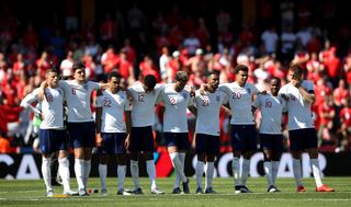 England players line up ahead of the shoot-out