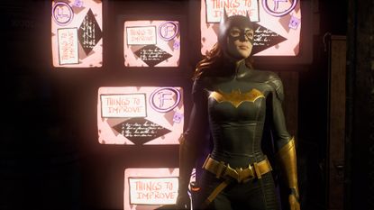Batgirl stands infront of F rating from Harley Quinn