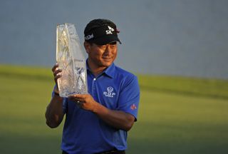 KJ Choi holds The Players Championship trophy