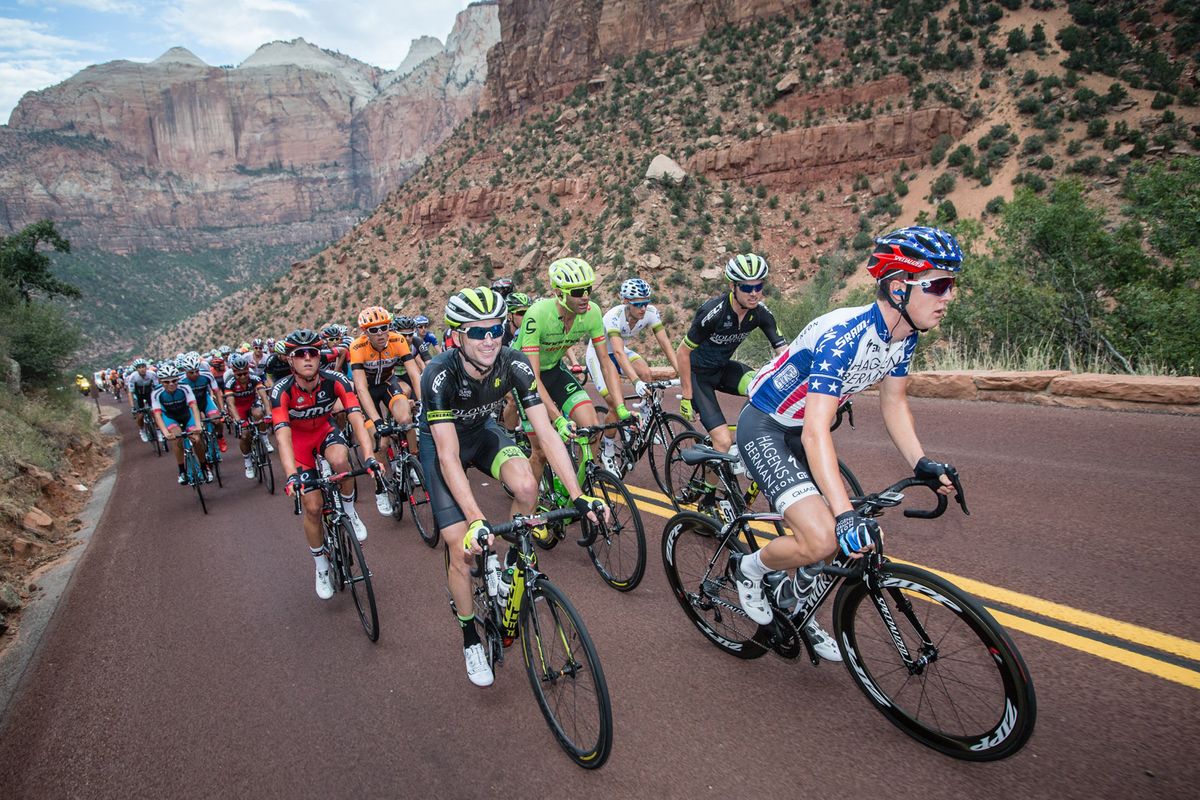 Gregory Daniel (Axeon) leads the peloton up one of todays first climbs