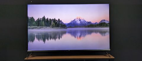 Amazon Omni QLED Hero 21:9 image with sunset lake landscape on screen 
