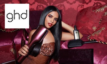 GHD logo top left with a picture of a woman posing with a flat iron straighteners