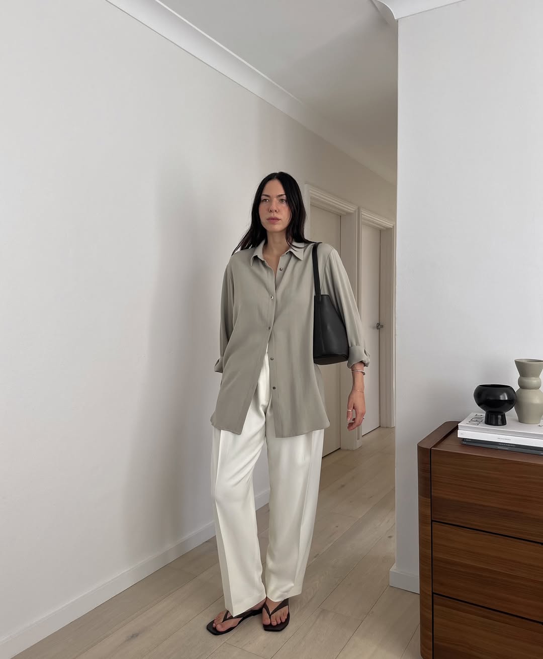Influencer Kaitlyn Ham wearing a silk shirt.