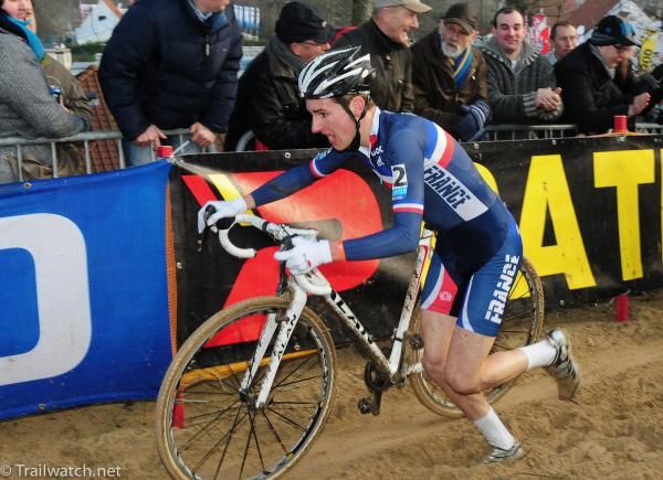 Quentin Jauregui (France) pushing his bike at the top of the highest dune