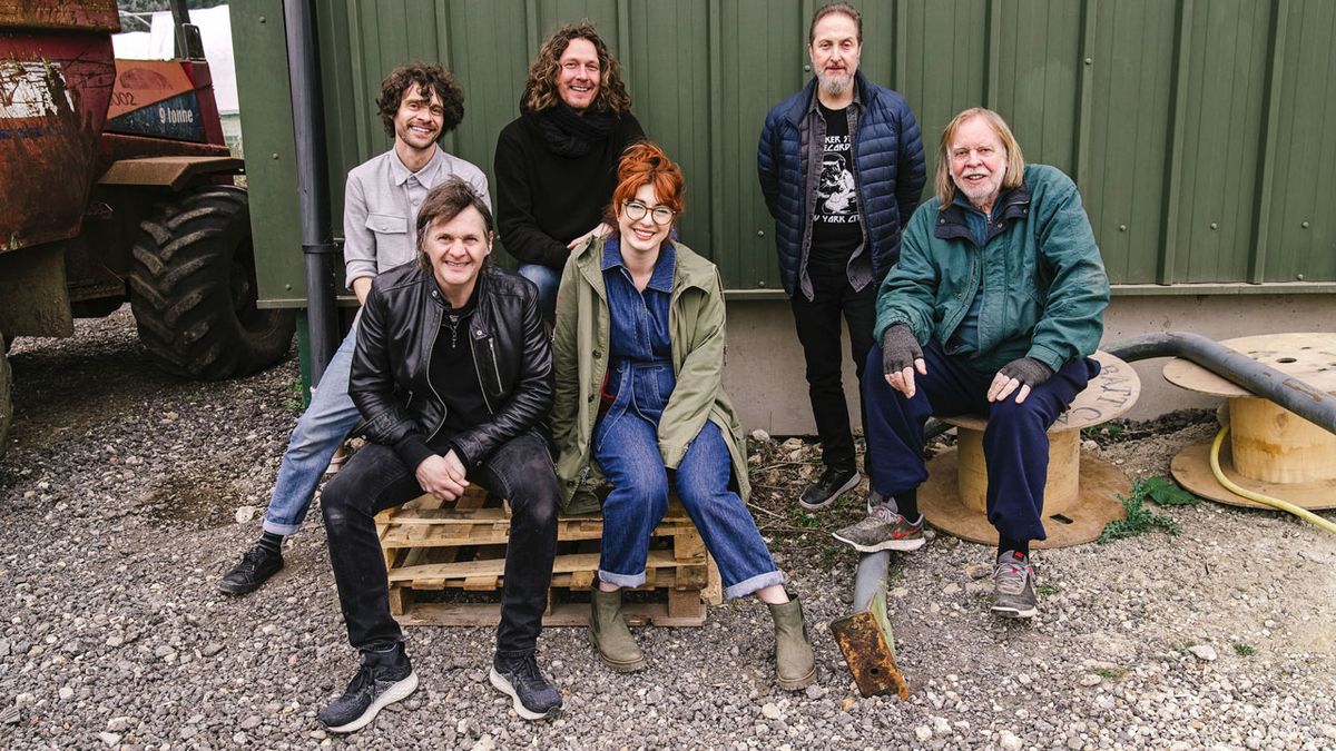 Rick Wakeman and the English Rock Ensemble outside a barn