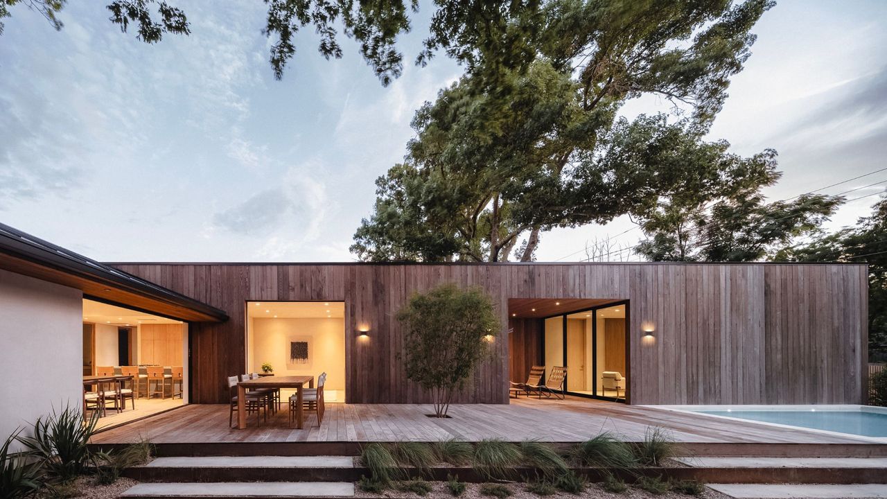 A backyard of a home with furniture 