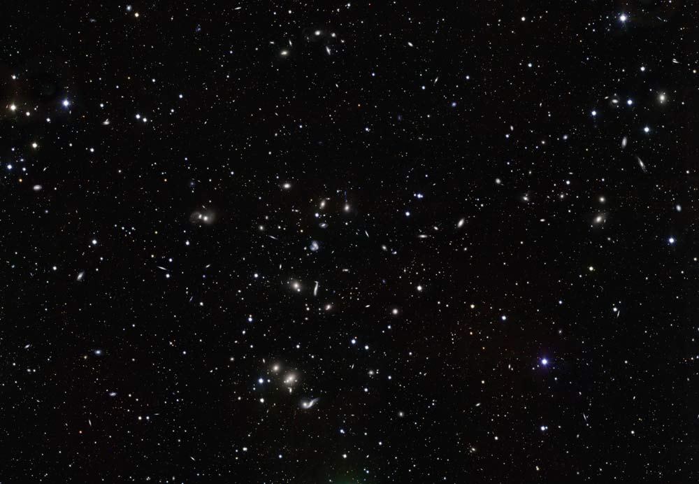 This new image, taken with the European Southern Observatory's VLT Survey Telescope (VST), shows a wide variety of interacting galaxies in the young Hercules galaxy cluster. This picture has been cropped and does not cover the full VST field of view.