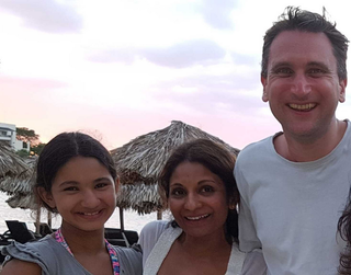 Arya Lloyd on holiday with parents Brundha and Geraint