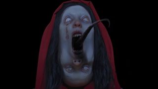 A red-hooded monster with two faces, one below the other one, with a tongue sticking straight out in trailer for Tenebris Somnia video game