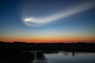 SpaceX's Crew-2 mission streaks across the sky, as seen here from Sullivan's Island in South Carolina on April 23, 2021.