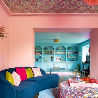 Pink room with patterned wallpaper