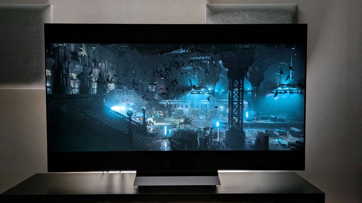 The LG C6 OLED TV with The Batman on screen, showing an aerial shot of the Batcave. The C6 demonstrates strong contrast, with lights in the Batcave looking bright.
