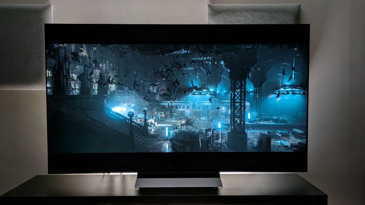 The LG C6 OLED TV with The Batman on screen, showing an aerial shot of the Batcave. The C6 demonstrates strong contrast, with lights in the Batcave looking bright.