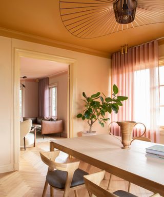 dining room with yellow walls and ceiling