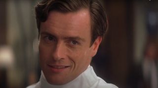 Toby Stephens grins in fencing gear in Die Another Day.