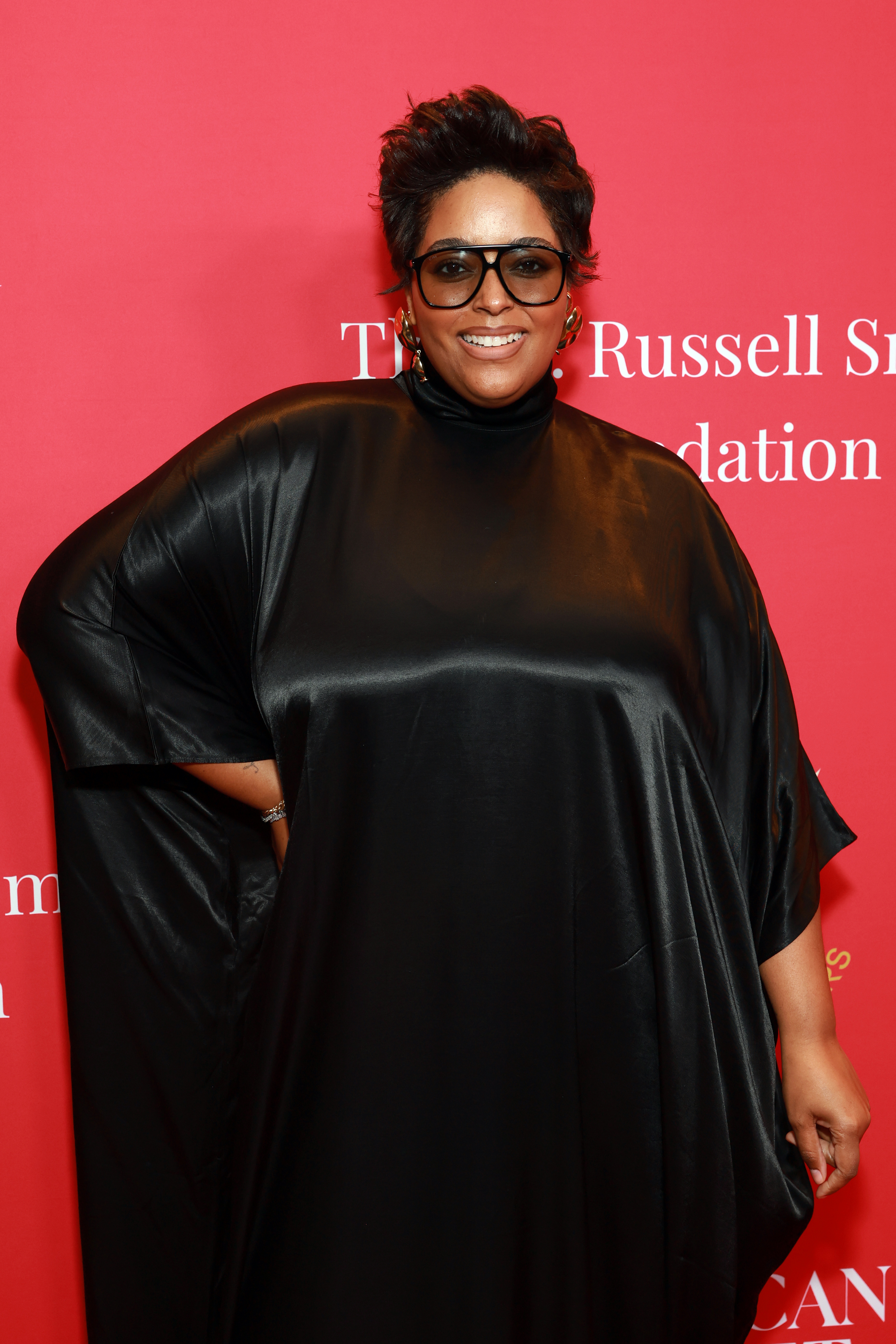 Courtney Mays in a black caftan and sunglasses attends American Ballet Theatre's (ABT) Holiday Benefit at The Beverly Hilton on December 15, 2025