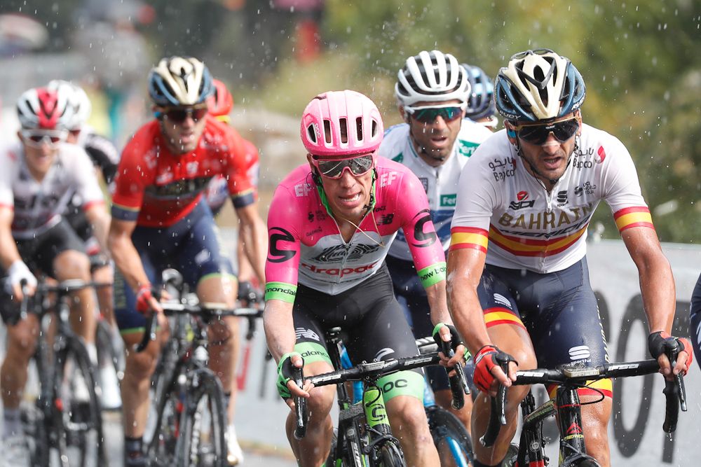 Rigoberto Uran rides in the rain during stage 11 at the Vuelta
