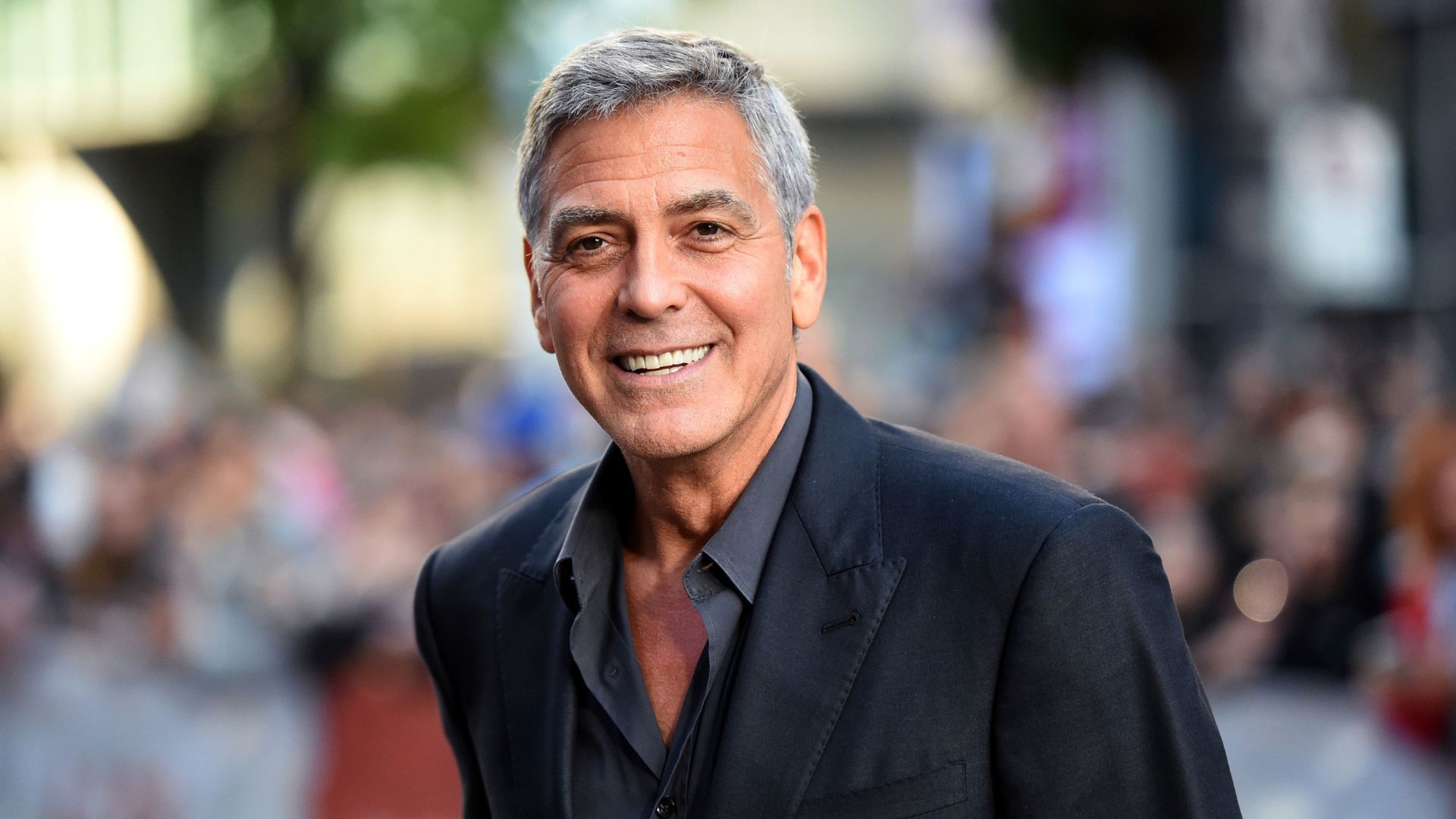 george clooney looking at the camera