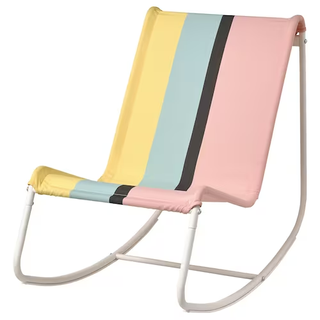 A striped rocking chair on a white metal frame