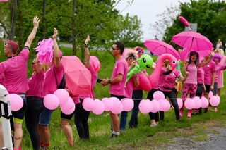 VISEGRAD HUNGARY MAY 06 Fans dressed in pink wait for the peloton to pass during the 105th Giro dItalia 2022 Stage 1 a 195km stage from Budapest to Visegrd 337m Giro WorldTour on May 06 2022 in Visegrad Hungary Photo by Tim de WaeleGetty Images