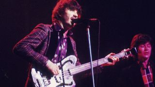 Rick Danko and Robbie Robertson of The Band perform on stage at Madison Square Garden in New York on 29th January 1974. Danko plays an Ampeg AUB-1 fretless bass guitar.