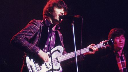 Rick Danko and Robbie Robertson of The Band perform on stage at Madison Square Garden in New York on 29th January 1974. Danko plays an Ampeg AUB-1 fretless bass guitar.