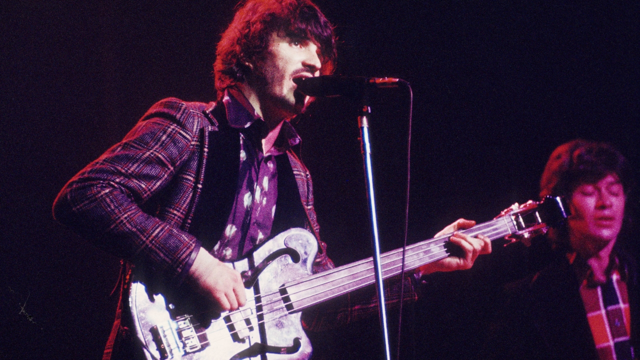 Rick Danko and Robbie Robertson of The Band perform on stage at Madison Square Garden in New York on 29th January 1974. Danko plays an Ampeg AUB-1 fretless bass guitar.