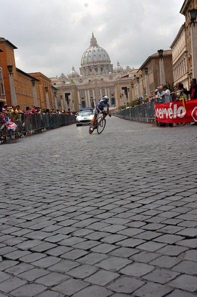 A Quick Step rider negotiates a left-hand turn in the Giro's final time trial