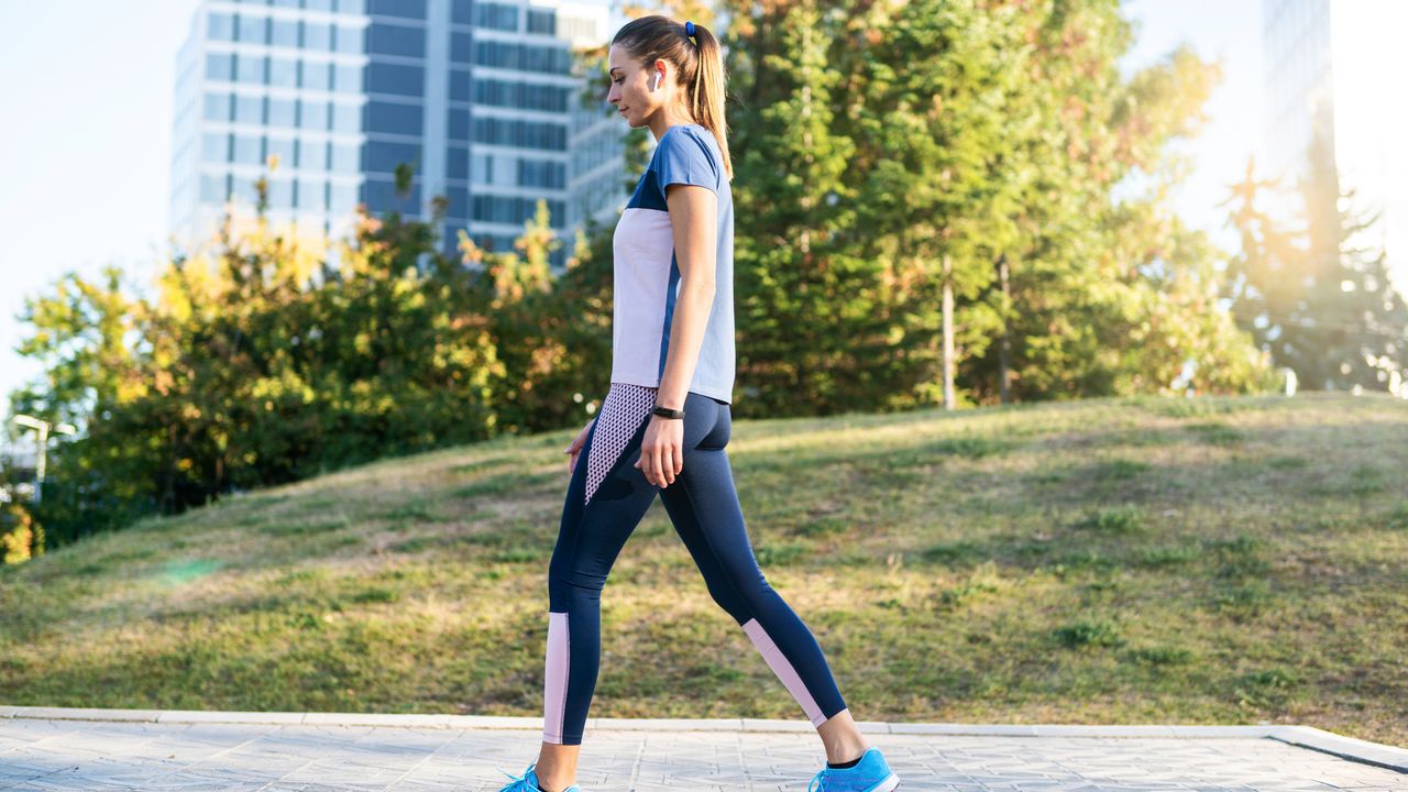 Woman walking outdoors