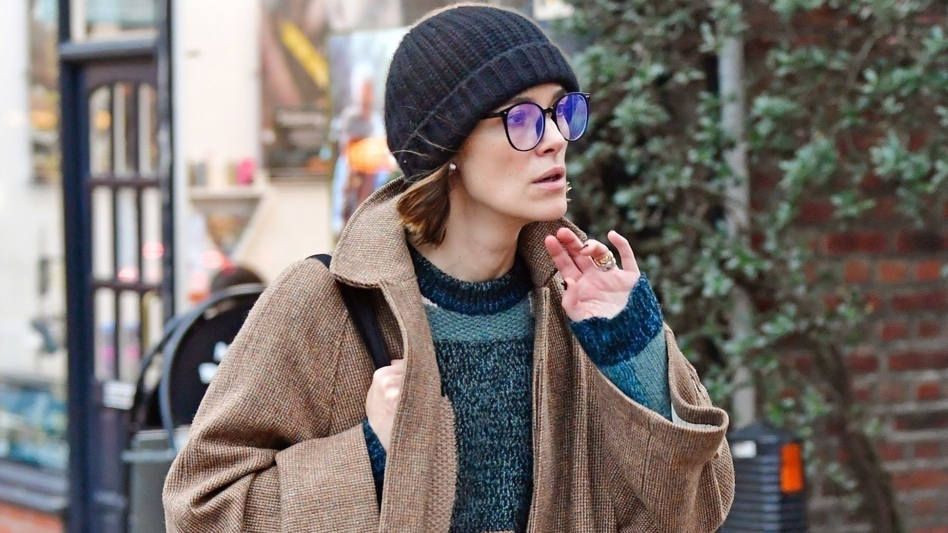 Kiera Knightley wears Chelsea boots with jeans in London.