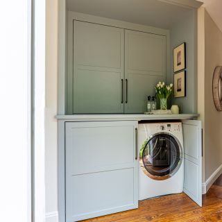 washer dryer hidden by cabinetry