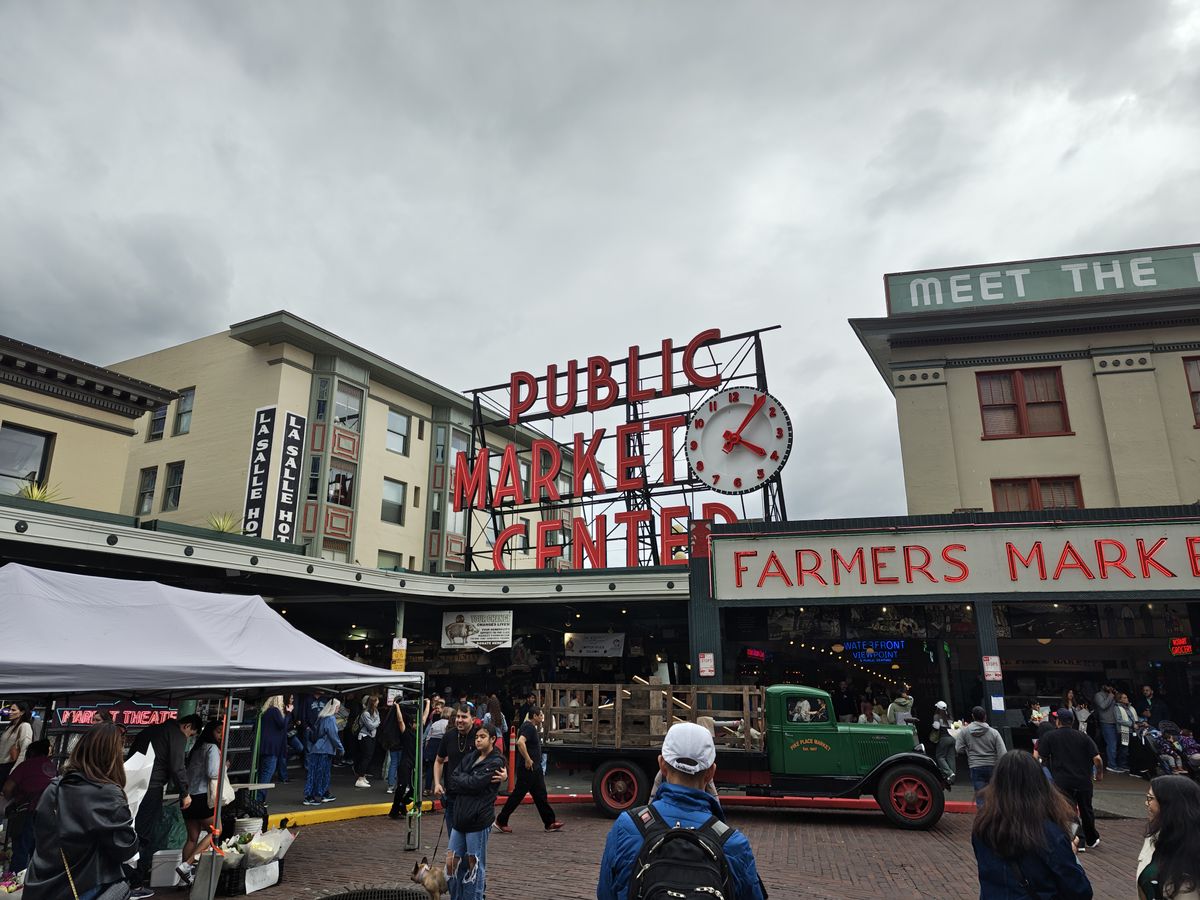 A red "Public Market Center" sign