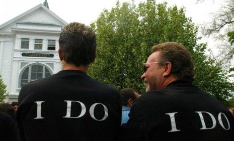 A couple waits outside a Provincetown, Mass. town hall in 2004