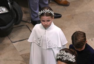 Princess Charlotte in a white Alexander McQueen dress for the Coronation