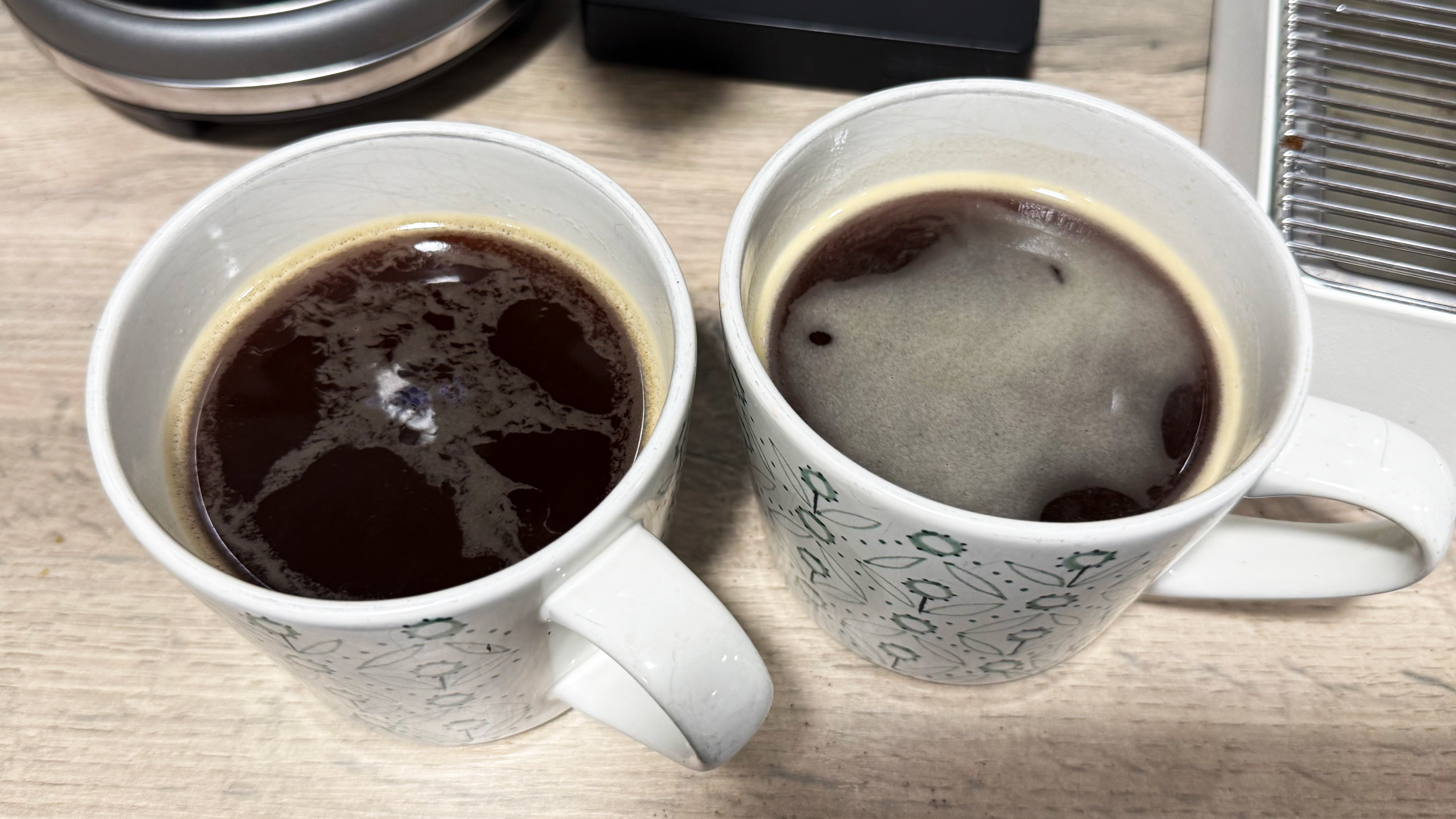 a photo of a black americano made on the breville bambino and lelit mara x3