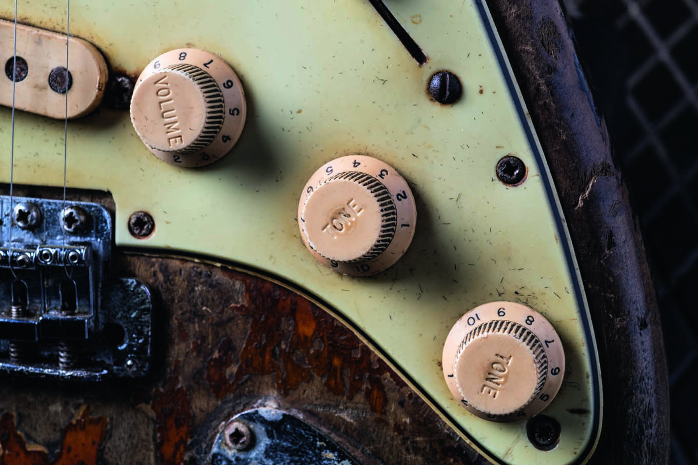 The volume and tone knobs on Rory Gallagher's 1961 Fender Stratocaster, shot up-close