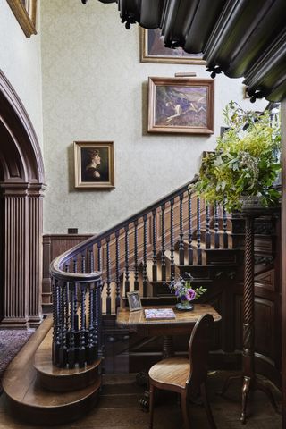 grand staircase with wooden panelling in a Georgian home