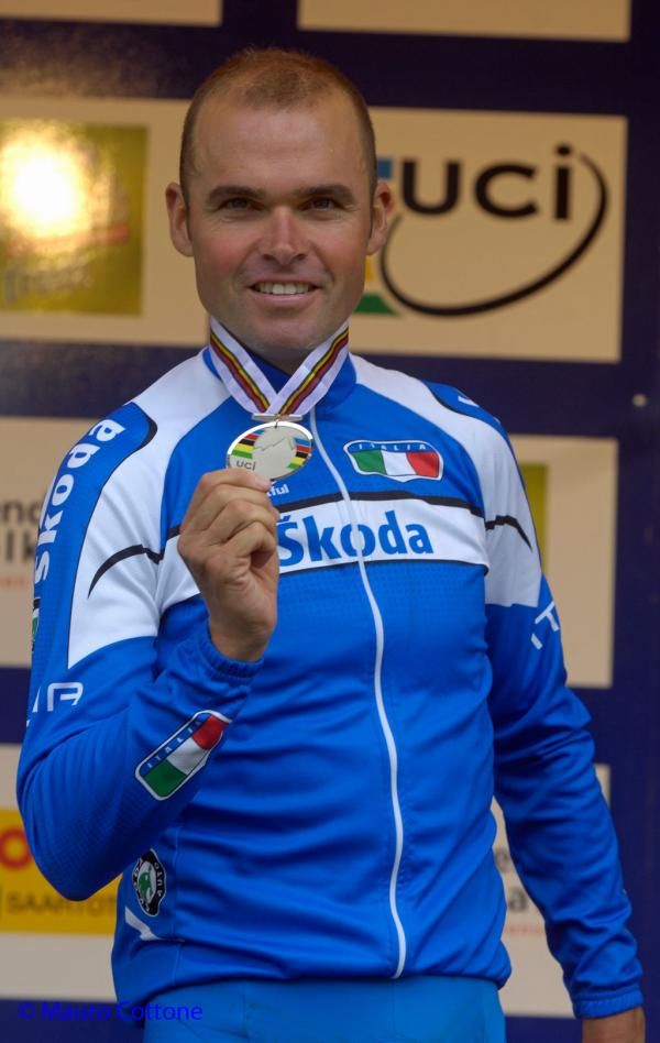 Mirko Celestino (Italy) shows off his silver medal.