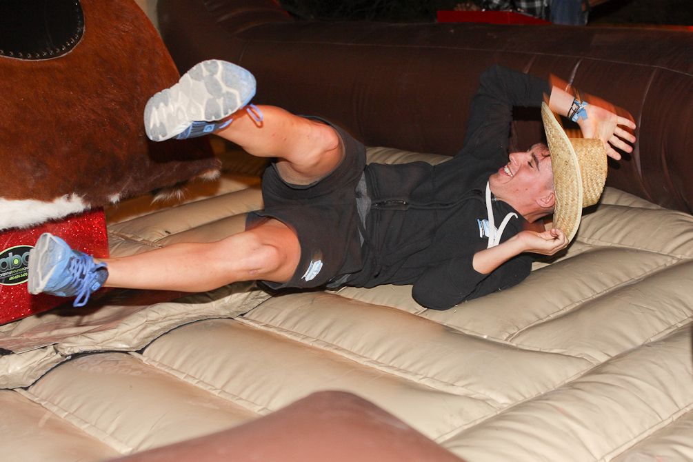 A Polartec-Kometa rider hits the deck after falling from the mechanical bull