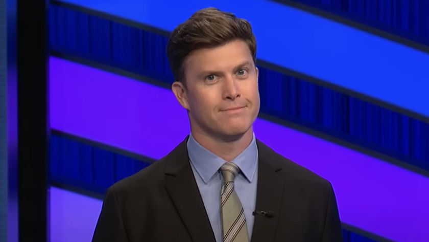 Screenshot of Colin Jost smizing on Pop Culture Jeopardy