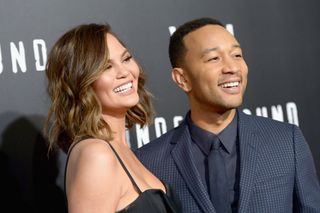 Model Chrissy Teigen and husband John Legend at the season 2 premiere of WGN America's "Underground" screening on March 1, 2017, in Westwood, California.