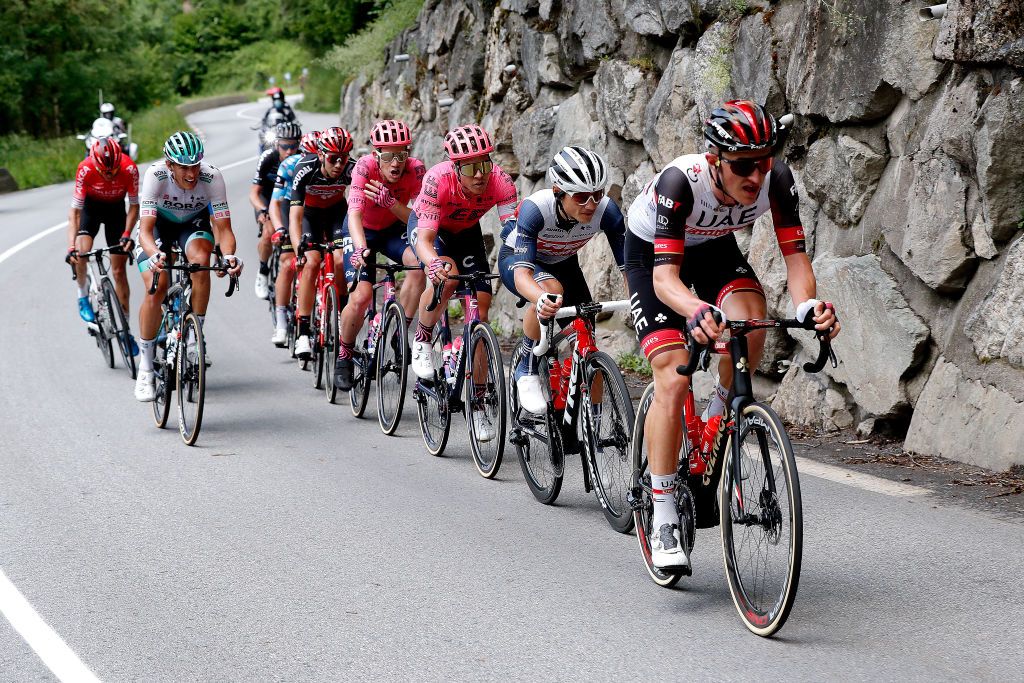 LA PLAGNE FRANCE JUNE 05 Mikkel Bjerg of Denmark and UAE Team Emirates Kenny Elissonde of France and Team Trek Segafredo Lawson Craddock of United States and Team EF Education Nippo Michael Valgren Andersen of Denmark and Team EF Education Nippo Steff Cras of Belgium and Team Lotto Soudal Matthew Holmes of United Kingdom and Team Lotto Soudal Polka Dot Mountain Jersey Martijn Tusveld of Netherlands and Team DSM Warren Barguil of France and Team Arka Samsic Nils Politt of Germany and Team Bora Hansgrohe in the chase group during the 73rd Critrium du Dauphin 2021 Stage 7 a 1715km stage from SaintMartinLeVinoux to La Plagne 2072m UCIworldtour Dauphin dauphine on June 05 2021 in La Plagne France Photo by Bas CzerwinskiGetty Images
