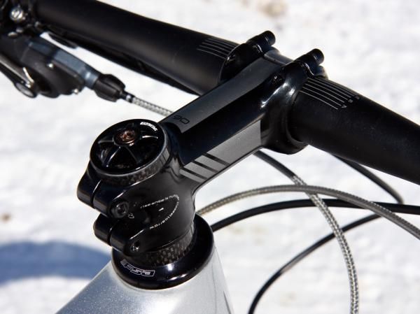 The angle-adjustable stem allows for finer handlebar positioning than fixed-angle stems.