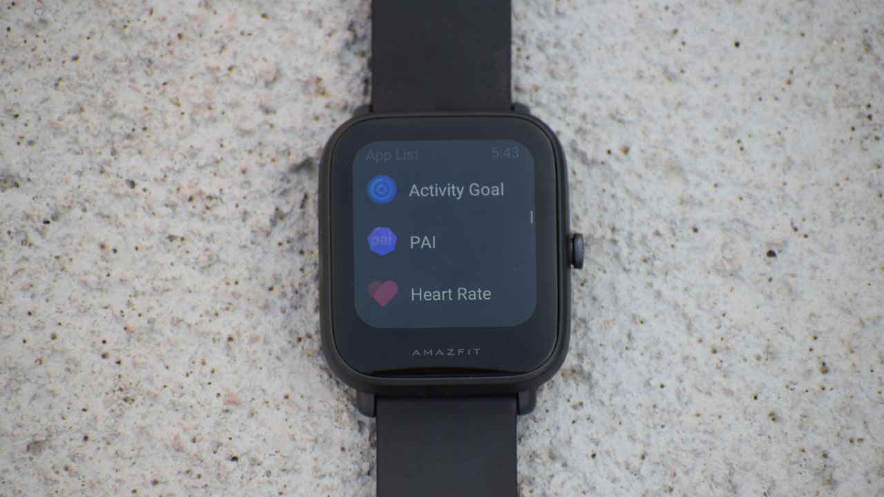 An Amazfit Bip U Pro with the screen on