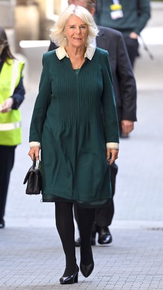 Queen Camilla in a simple colour-block dress