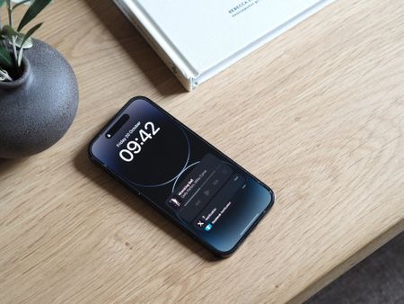 an iphone on a coffee table