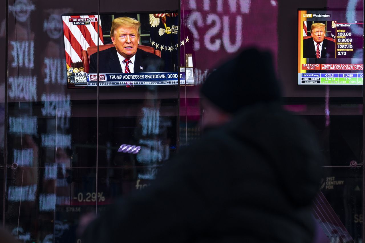 Trump&amp;#039;s address to the nation on a TV screen in Times Square