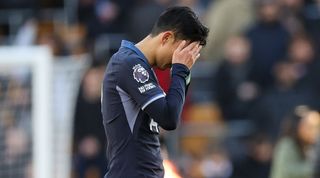 Tottenham's Son Heung-min looks dejected after Wolves score two late goals to beat Spurs at Molineux in November 2023.
