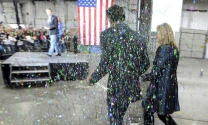 Mitt Romney and his wife are "glitter bombed" in Minnesota: A Colorado college student is the first person to be criminally charged for the sparkly stunt. 
